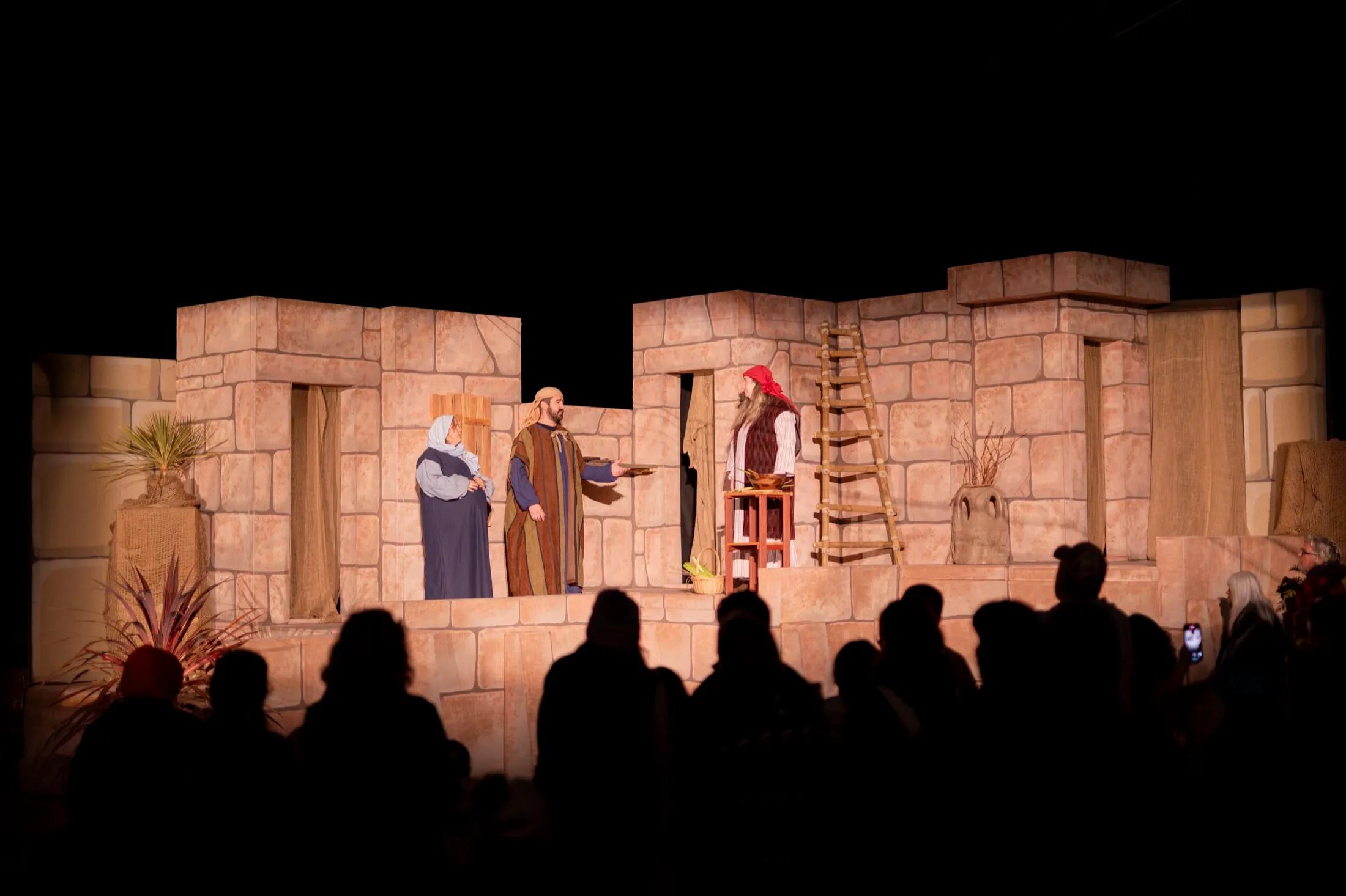 Mary and Joseph seek shelter on the stone village set at Streets of Bethlehem